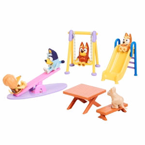 Bluey figurines playing on a see saw, swing and slide. These can be used to explore new foods in feeding therapy.